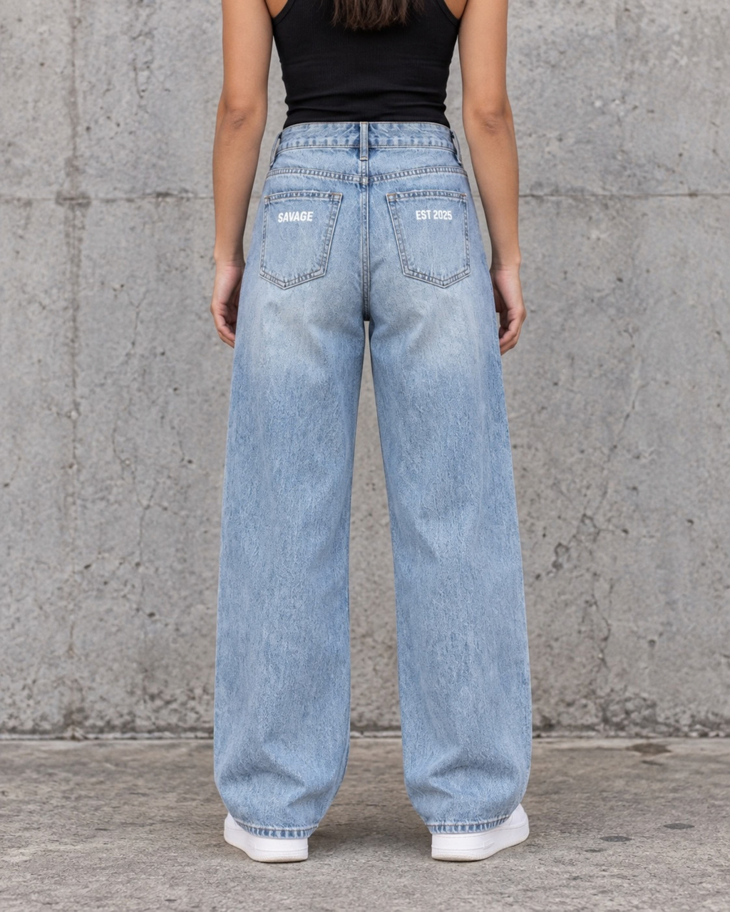 Savage Distressed Wide Leg Jeans in Vintage Blue.