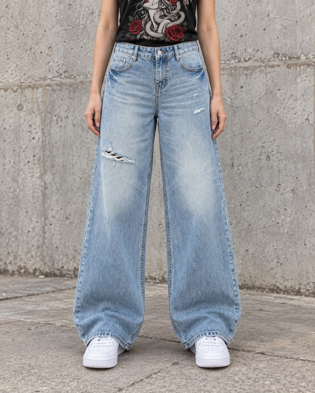 Savage Distressed Wide Leg Jeans in Vintage Blue.